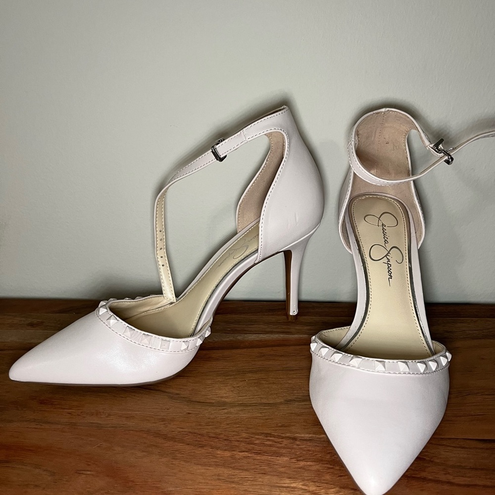 Ankle strap pointed toe heels.
